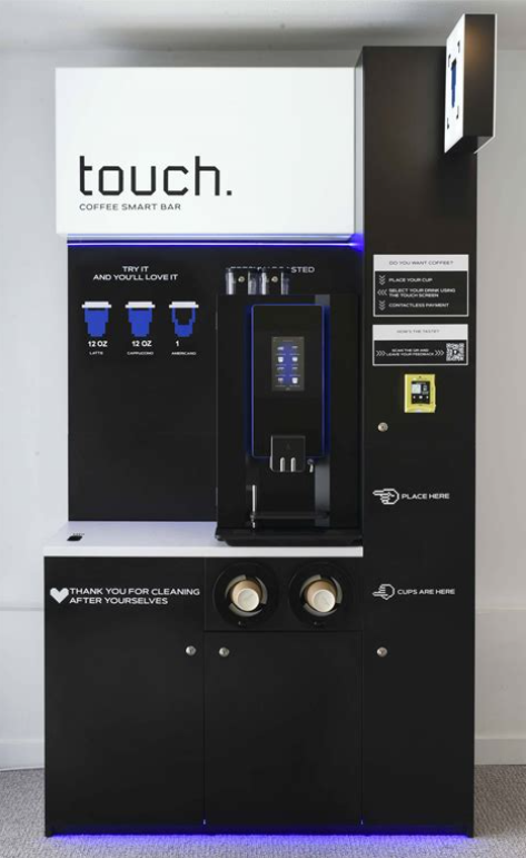 Compact Touch Coffee smart bar, with the touch. sign, cup wells, and payment reader.